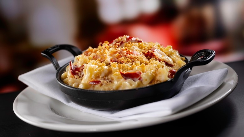 The Capital Grille's Lobster Mac and Cheese is served in a black cast iron dish