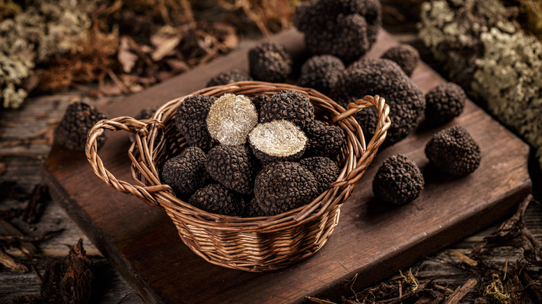truffles in a basket and on a wooden board