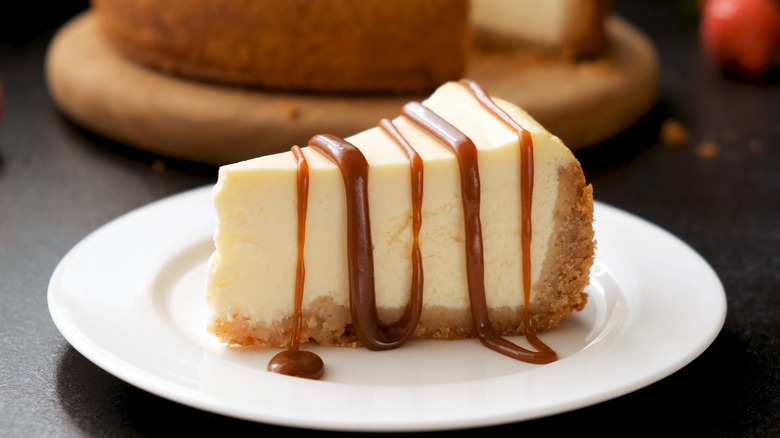 cheesecake covered in caramel drizzle