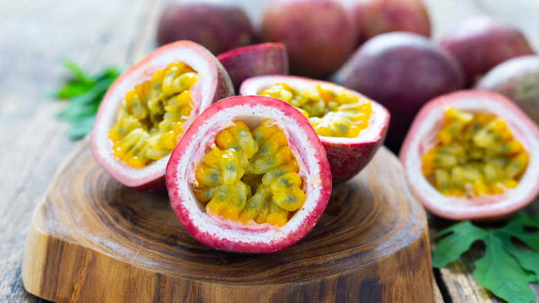 Passion fruit cut open on table