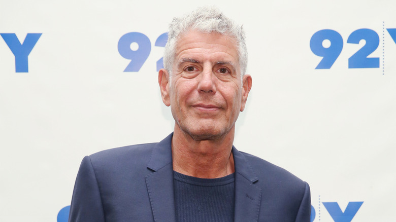 Anthony Bourdain smirking