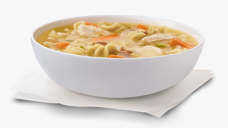 Chick-fil-A Chicken Noodle Soup in a white bowl on a white background