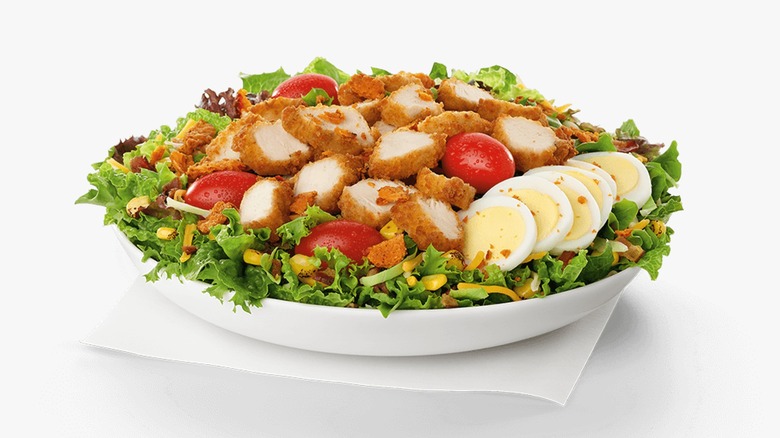 A Chick-fil-A Cobb Salad in a white bowl on a white background