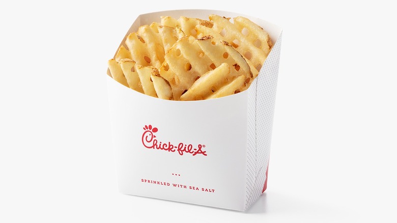 Chick-fil-A Waffle Potato Fries in a white paper container on a white background