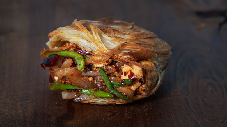 Roujiamo meat stuffed in a crispy fried bun