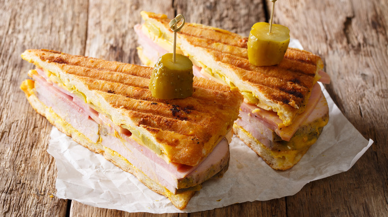 Cuban sandwiches on wooden table