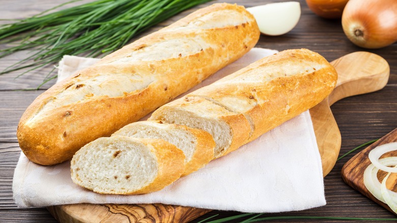 Two baguettes partly sliced