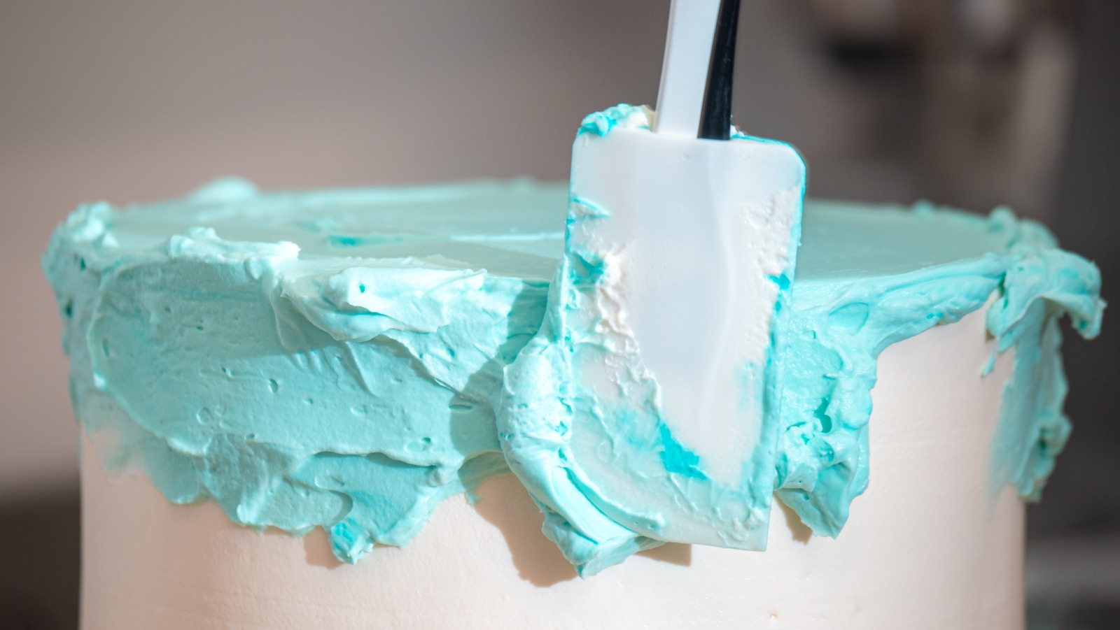 The Clever Microwave Hack That Makes Frosting Cakes So Much Easier