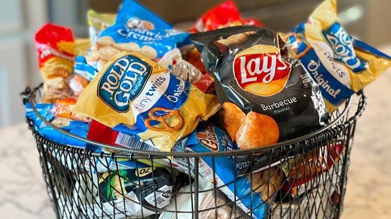 basket full of bags of chips