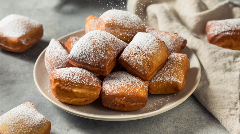 Beignets on a white plate