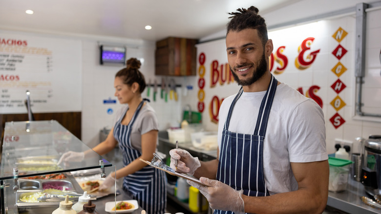 Fast food employee smiling