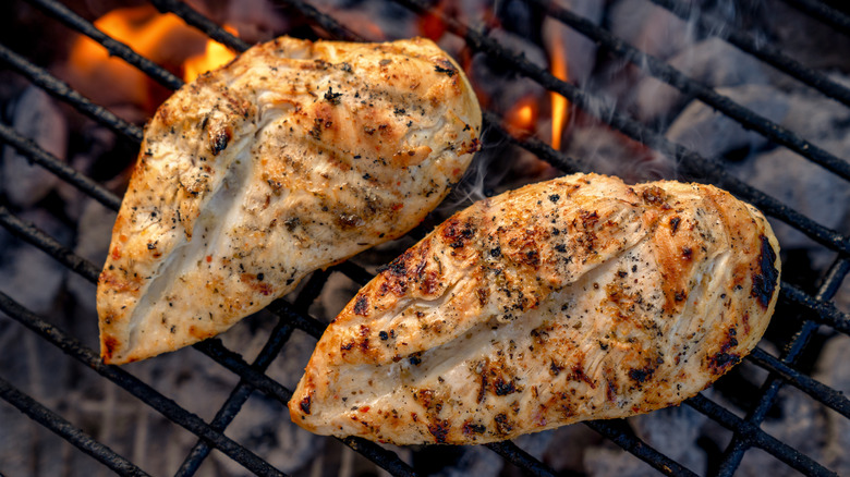 chicken on charcoal grill
