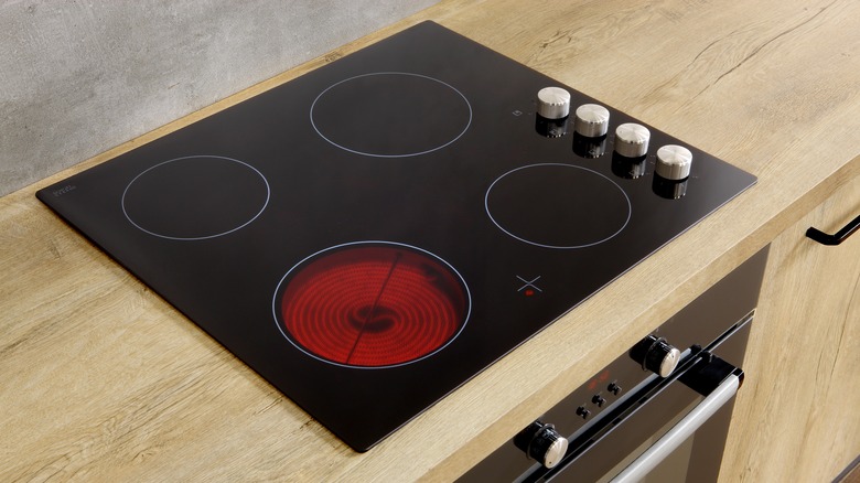 An electric stove with one heated burner