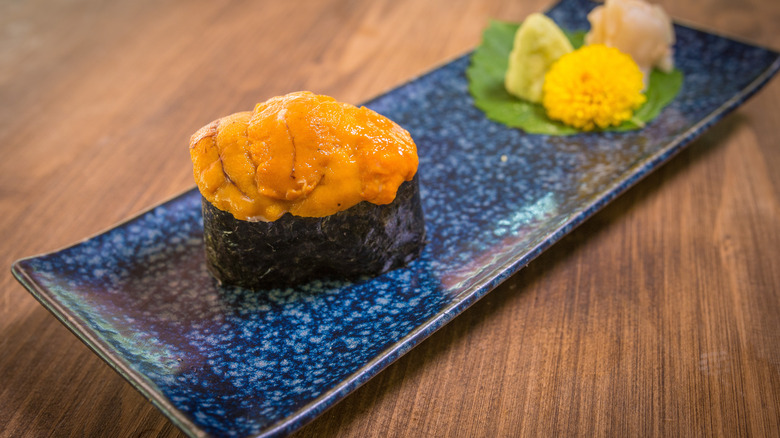 An uni roll on a plate