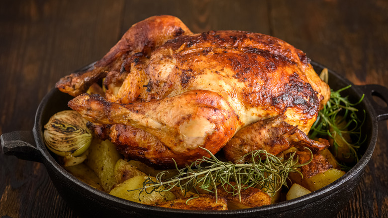 Roast chicken with potatoes and onions