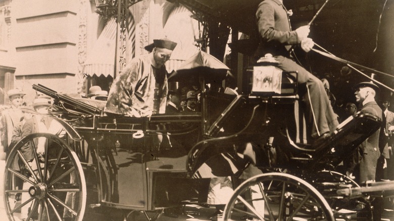 Li Hongzhang sitting in a wagon