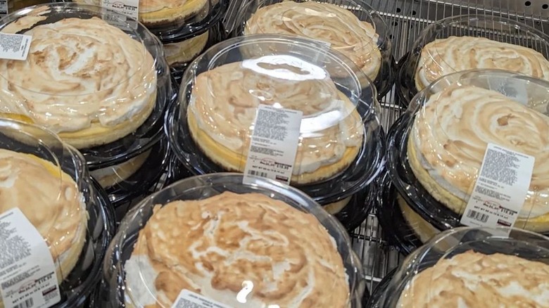 Costco lemon meringue cheesecakes in display case