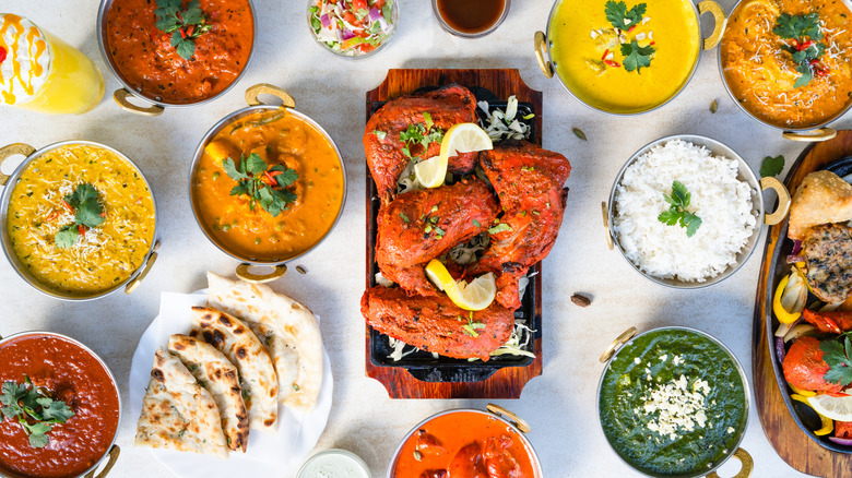 Various Indian dishes on table