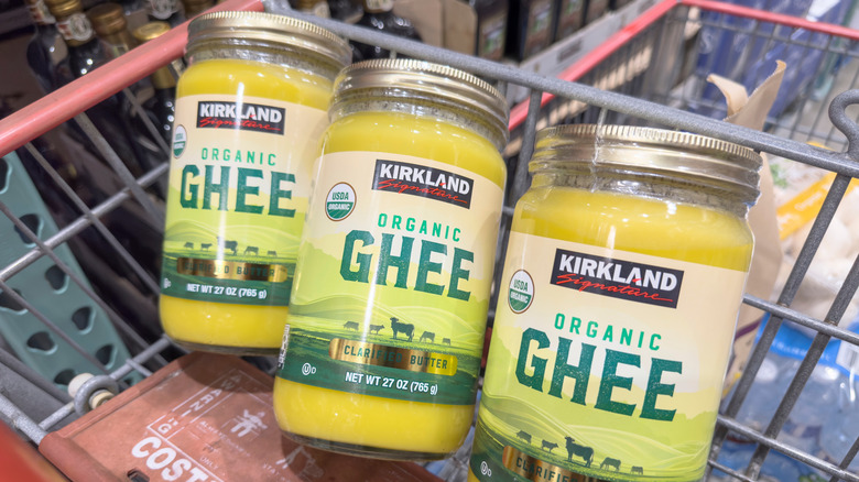 Three jars of Kirkland organic ghee in shopping cart
