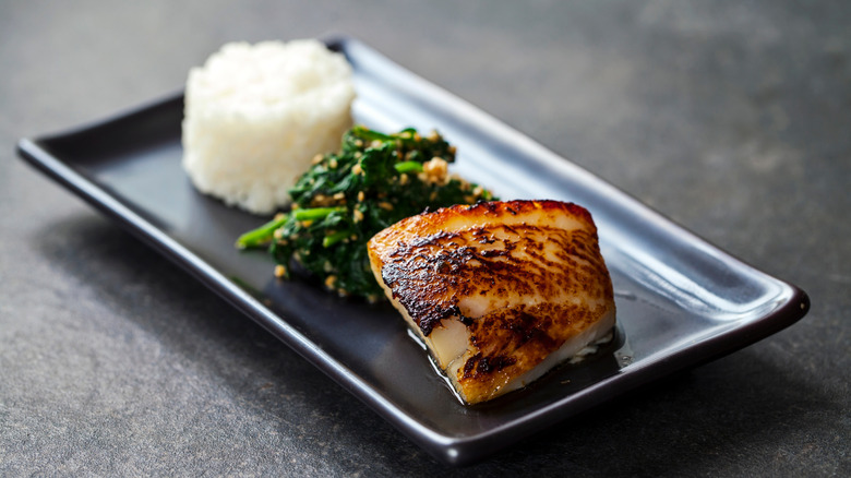 Miso black cod on plate with sides
