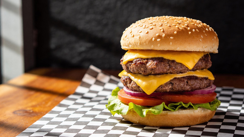 A cheeseburger stacked with two patties