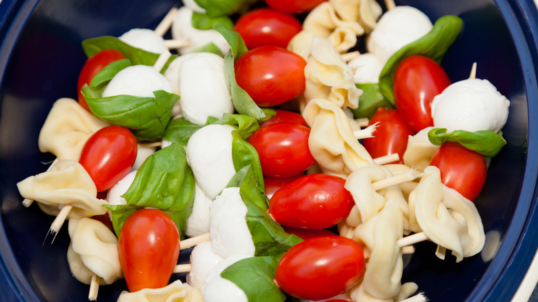 tortellini skewers with tomatoes, cheese, and basil