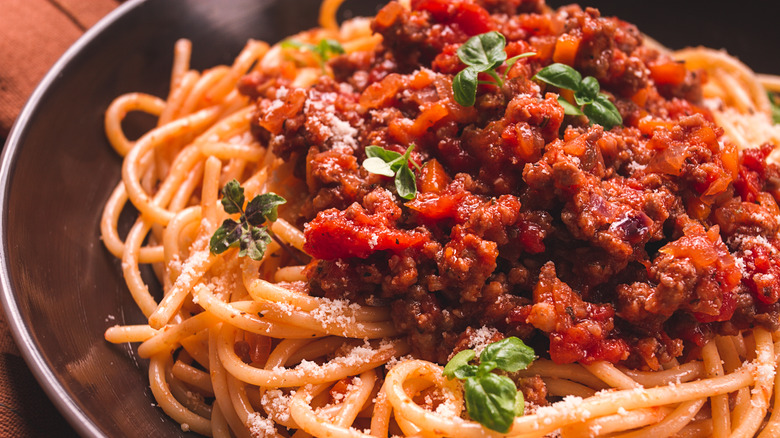 spaghetti topped with bolognese sauce