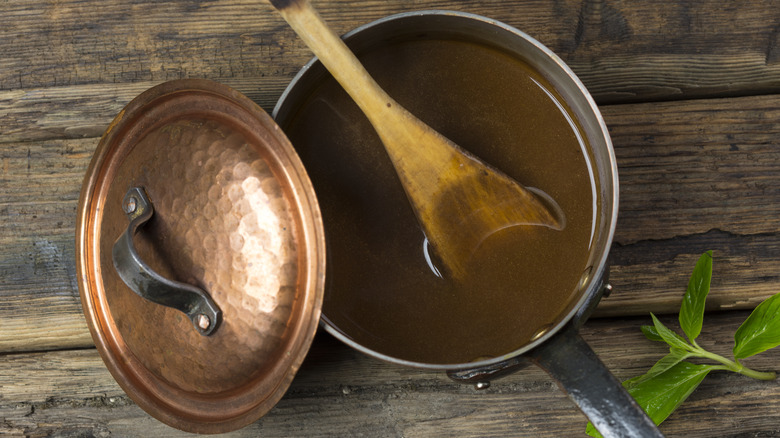 Gravy pot with spoon