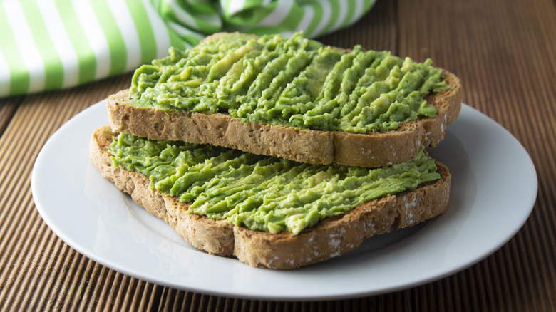 two pieces of avocado toast