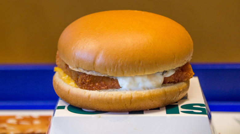 A Filet-O-Fish sandwich from McDoanld's on top of its box