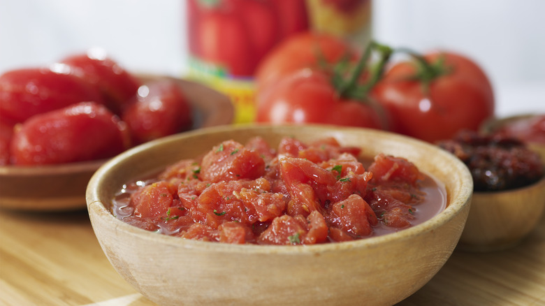 canned salsa in a wooden bowl