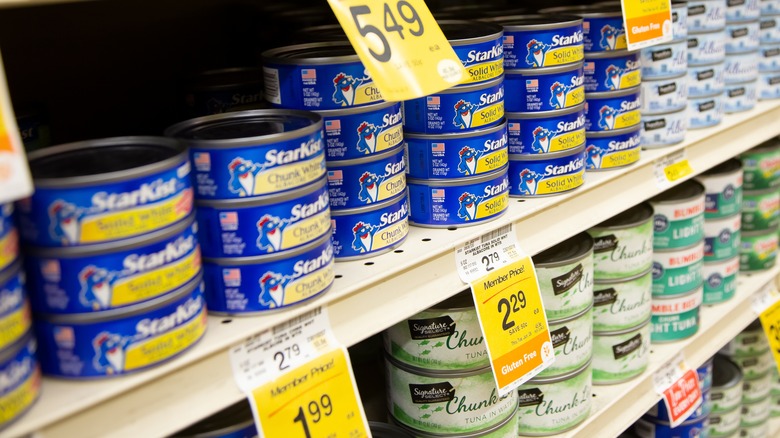 Canned tuna on grocery shelf