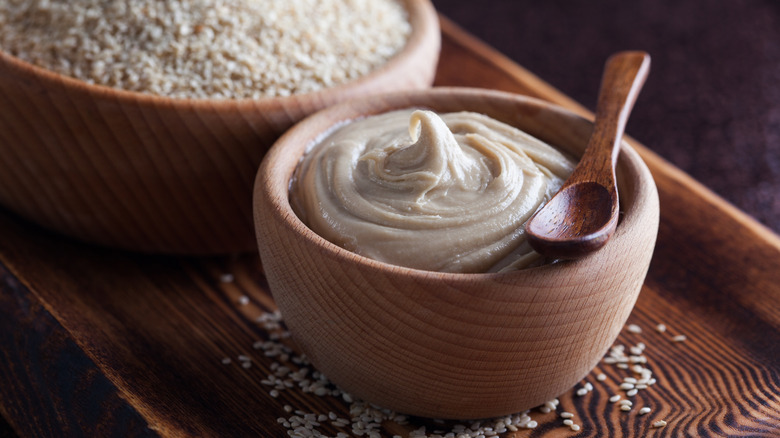 Tahini in a wooden bowl