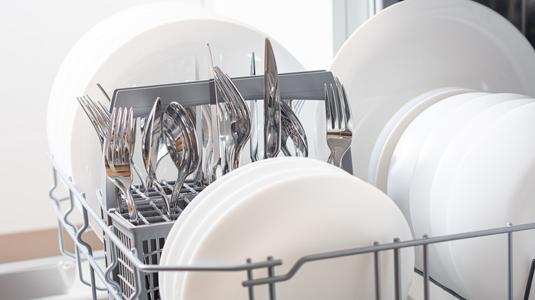 Clean dishes in a dishwasher