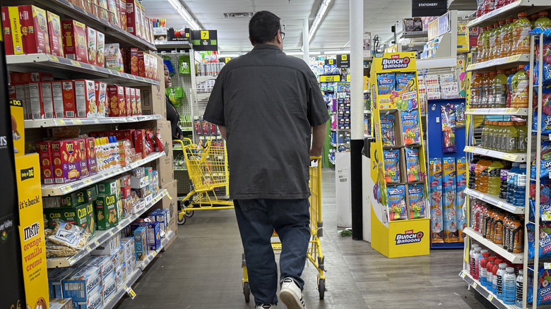 Shopper in a Dollar General store