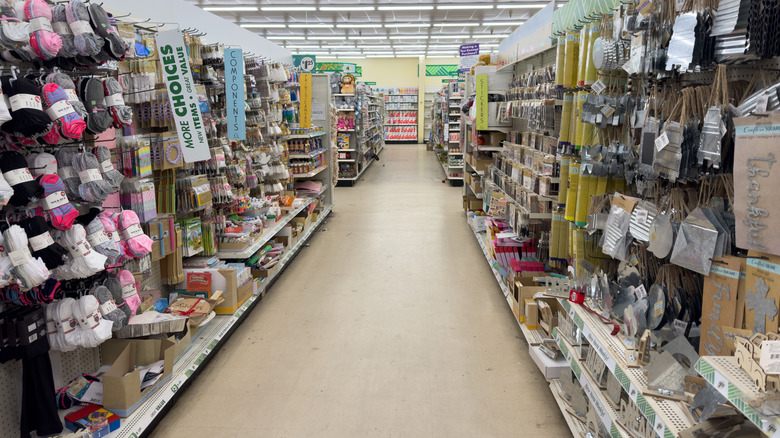 A shot of a Dollar Tree aisle with carious products lining shelves