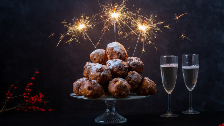 oliebollen with sparklers and champagne