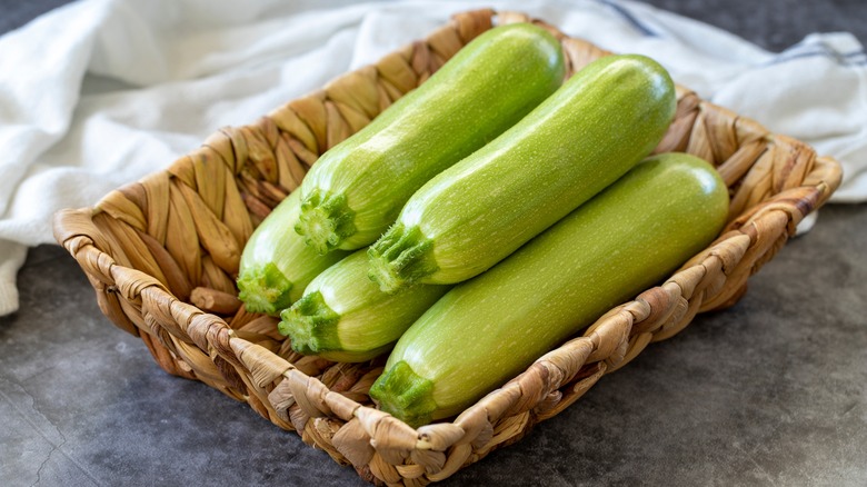 Whole zucchinis in a basket 