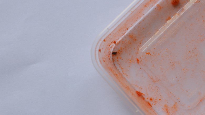 Stained plastic container