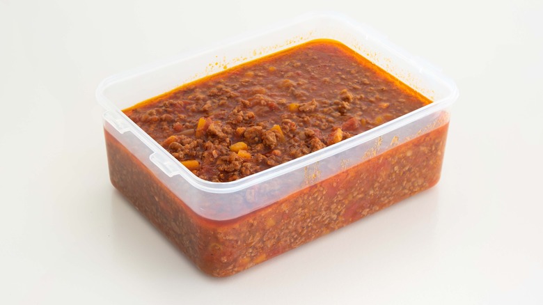 Sauce in plastic container