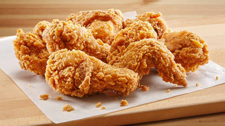 Fried chicken on wooden table