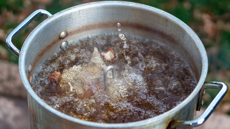 Vat of hot oil with Thanksgiving turkey