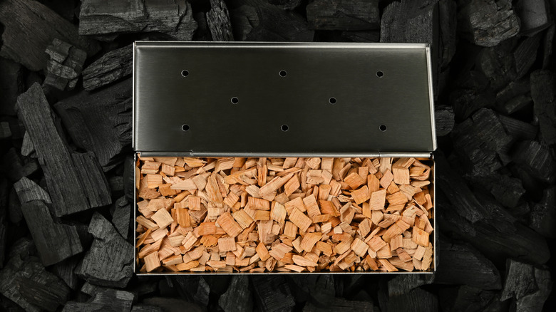 Smoker box full of wood chips