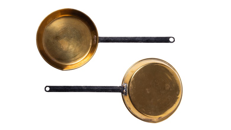Pair of vintage brass cooking pans
