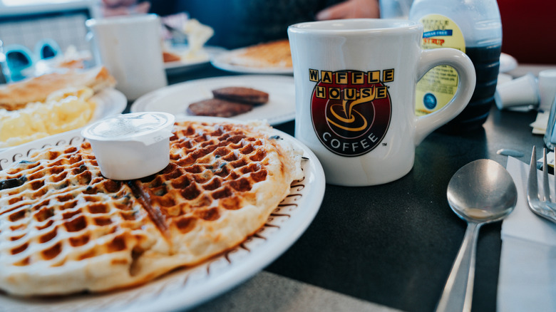 waffle, sausage, and coffee in Waffle House mug