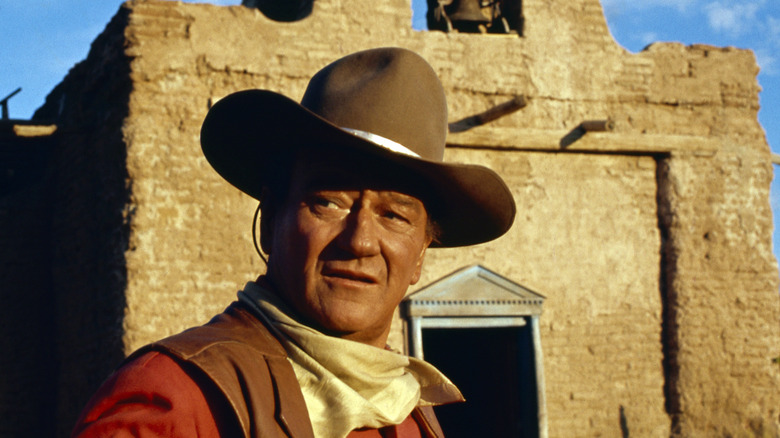 Actor John Wayne on the set of a western
