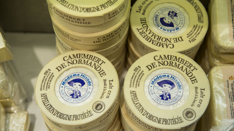 French camembert packages in the store