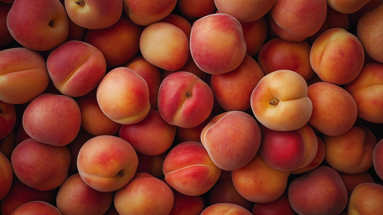 Fresh peaches in pile