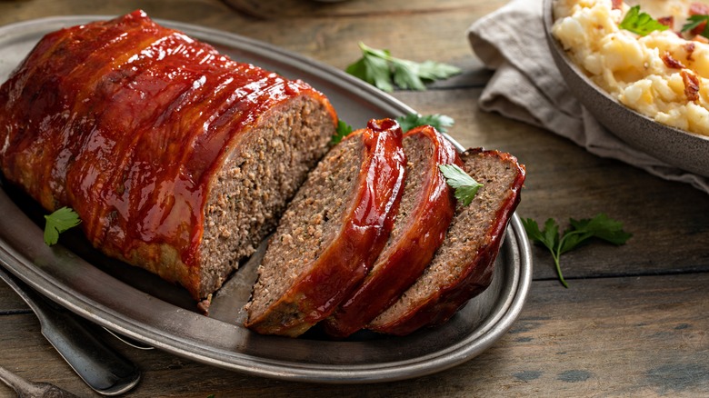 Meatloaf with glaze on table