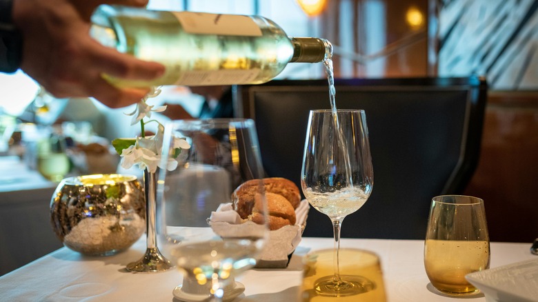 restaurant table with wine and bread